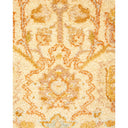 Intricate and symmetrical carpet pattern in warm tones; elegant aesthetic.