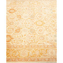 An ornate rug with intricate floral and geometric patterns.