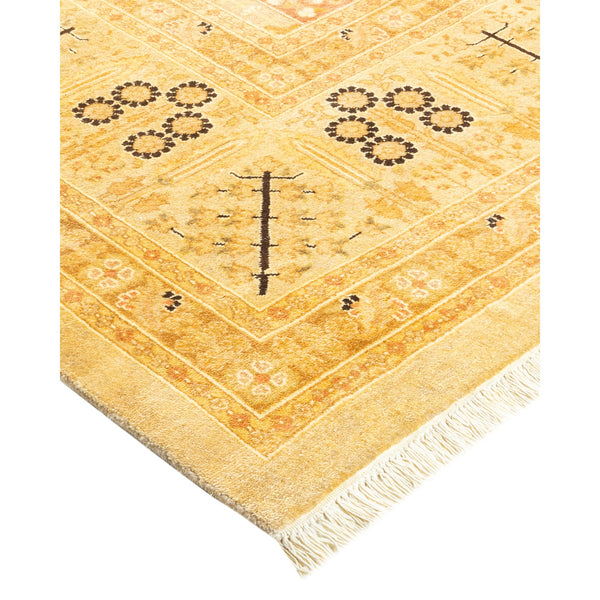 An intricately patterned, warm-toned rug with a traditional Middle Eastern design.