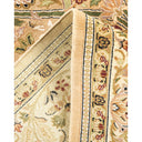 Exquisite handcrafted rug with rich floral patterns and intricate weaving.