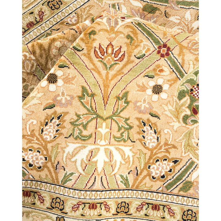 Close-up of an ornate, handcrafted rug with intricate floral patterns.