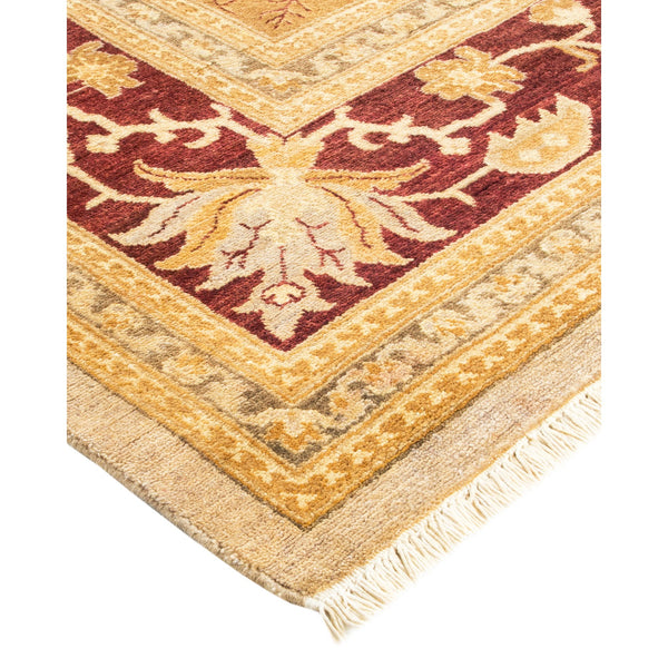 Exquisite traditional rug displays symmetrical floral motifs in rich colors.