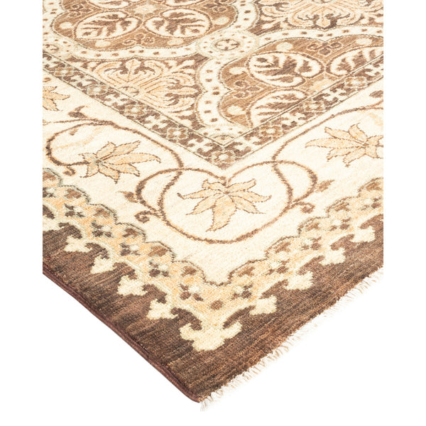 Intricate, symmetrical designs adorn a beautifully woven ornate area rug.