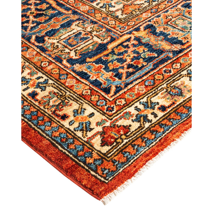 Vibrant and intricate handcrafted Oriental rug with geometric patterns.