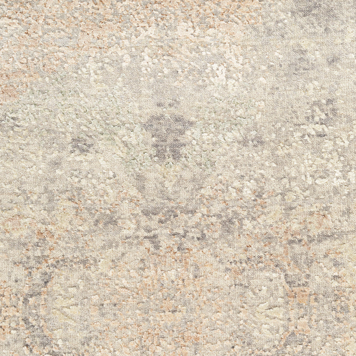 Abstract textured carpet with muted colors and plush velvety feel.