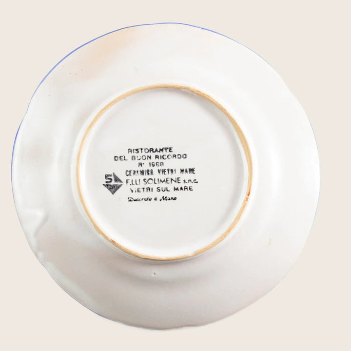 Vintage ceramic plate from Ristorante Del Buon Ricordo, Vietri Sul Mare, Italy. Hand decorated, showing signs of wear and age.
