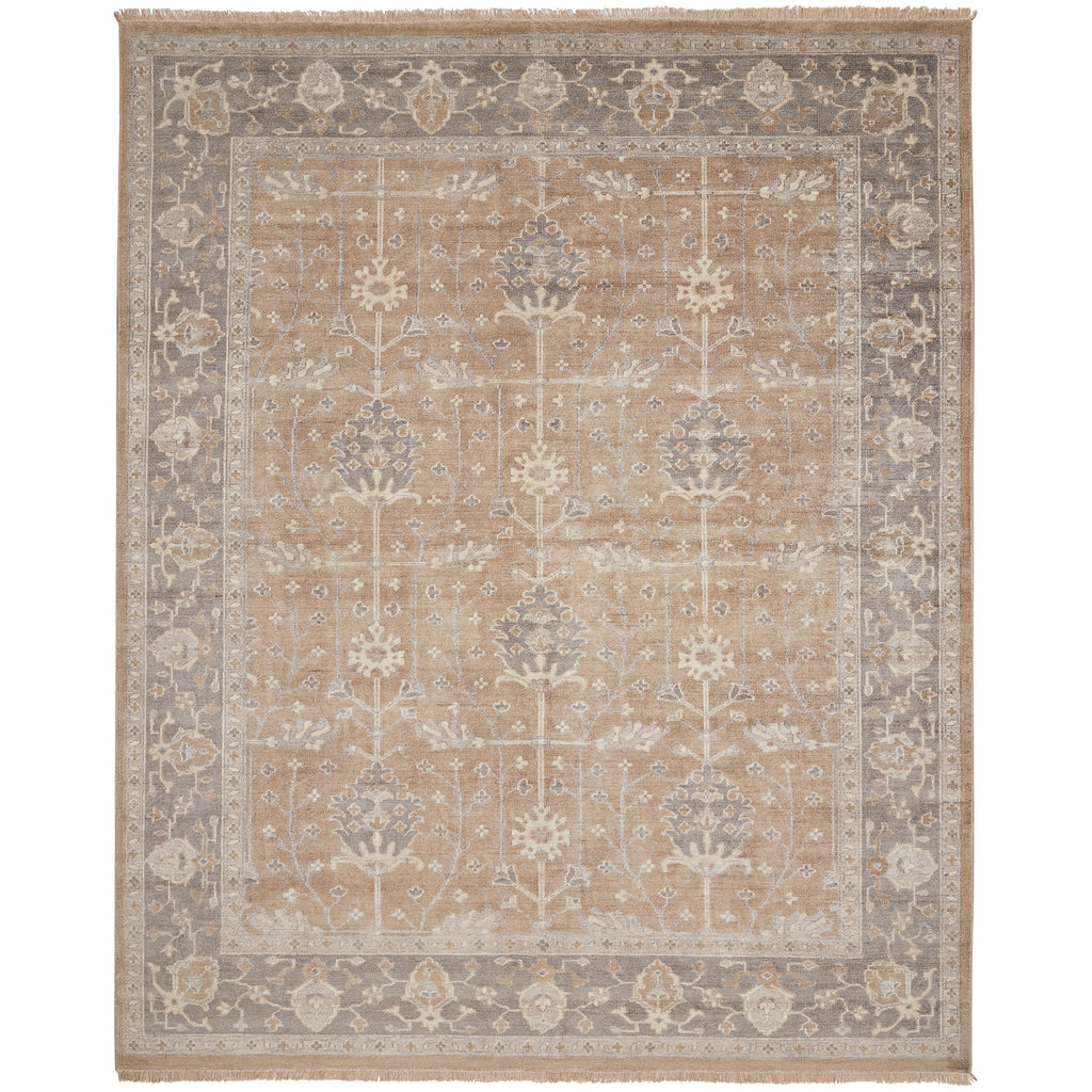 An intricately designed rectangular rug with muted colors and fringe.