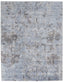Vintage-inspired rug with distressed floral pattern adds elegance to decor.