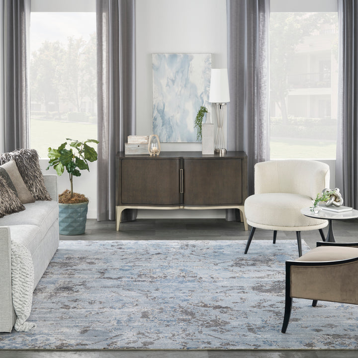 Contemporary living room with modern furniture and calming color palette.