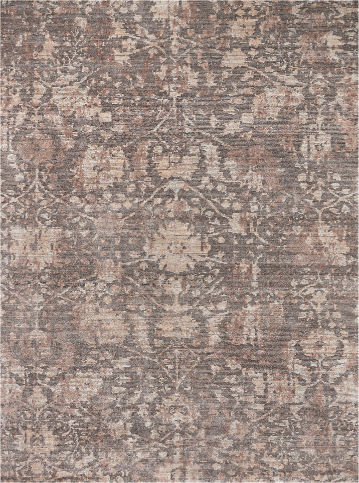 Intricate, vintage-style rug with distressed pattern adds elegance to interiors.