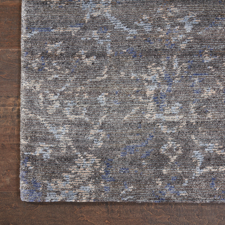 Modern abstract rug with complex pattern adds visual interest