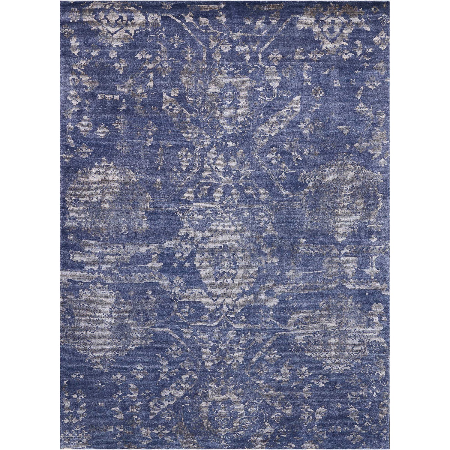 Intricately designed vintage rug with a Persian-inspired floral pattern.