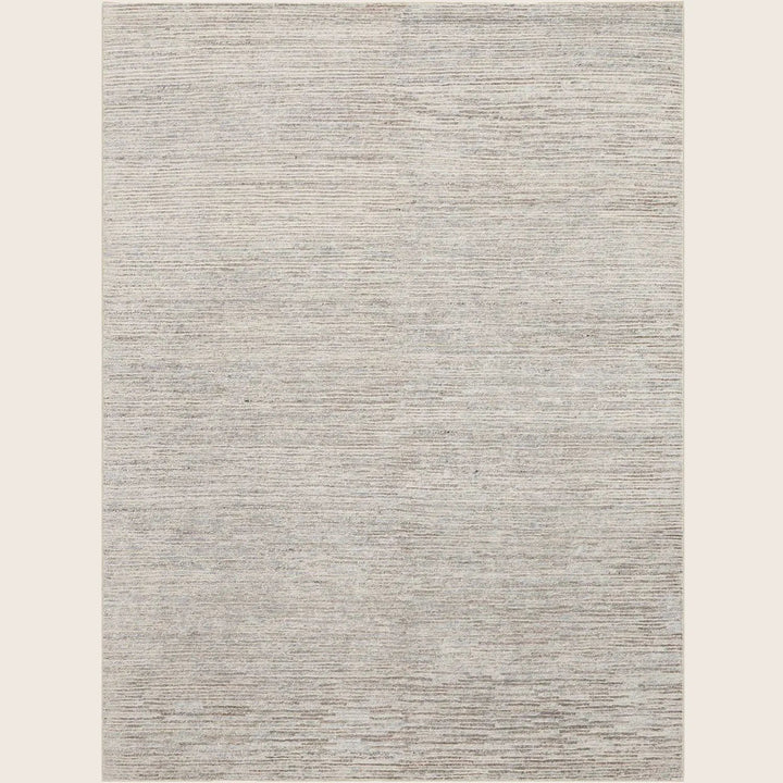 Contemporary heathered rug with neutral tones and versatile style.