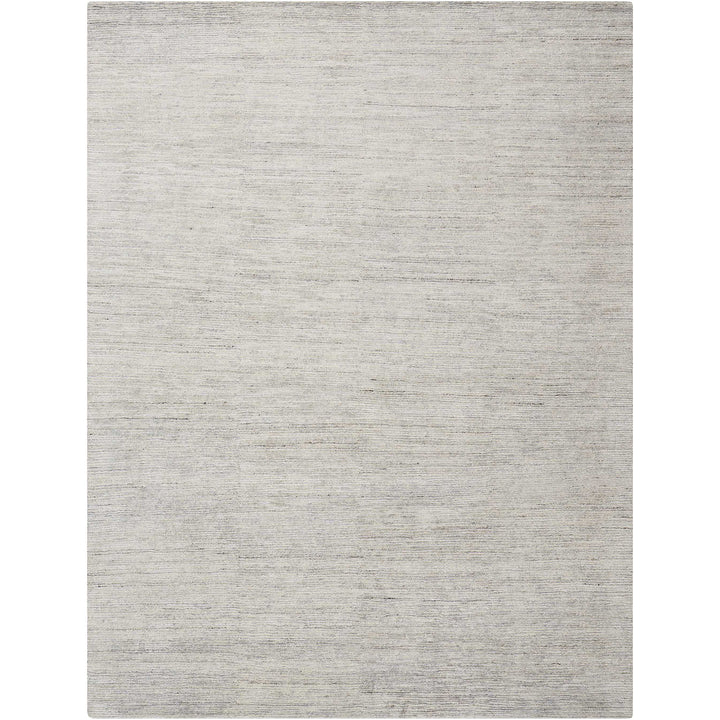Contemporary, textured area rug in neutral tones adds sophistication to interiors.