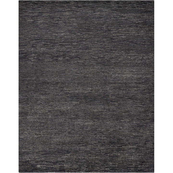 Rectangular rug with heathered gray tones and textured appearance.
