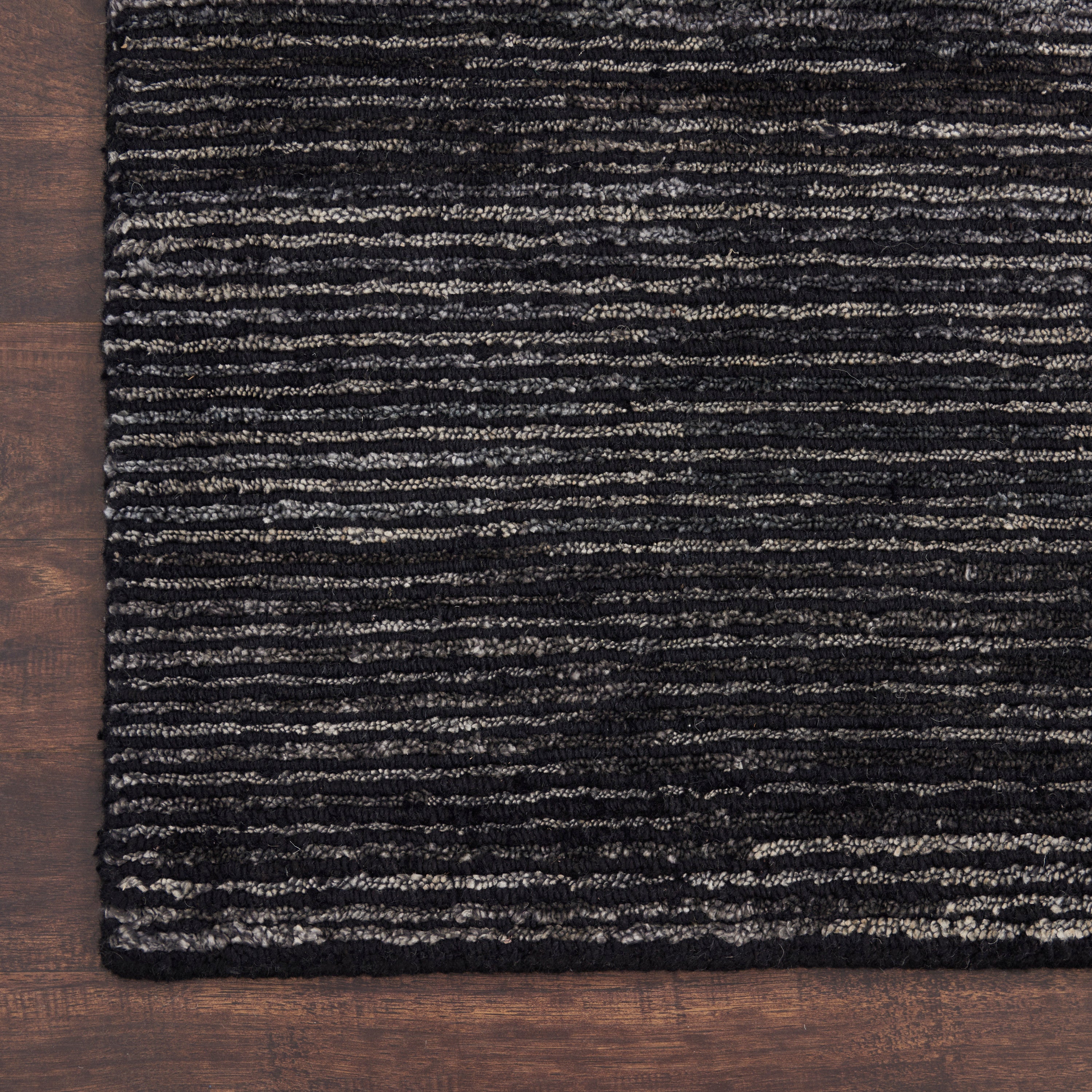 Close-up of a soft, textured fabric with horizontal stripes.