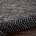 Close-up view of a textured, durable rug with striated pattern.