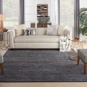 Cozy and modern living room featuring a stylish upholstered sofa.