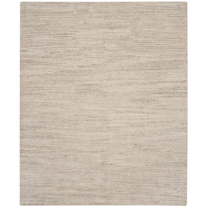Contemporary, neutral-toned rug with a subtle mottled texture.