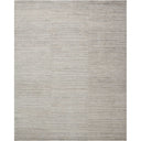 Minimalist gray rug with sleek design and textured gradient pattern.
