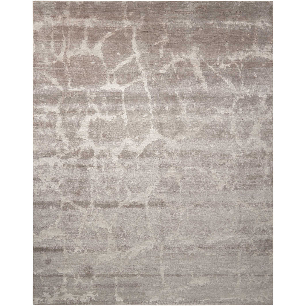 Modern abstract area rug with neutral tones and organic design.