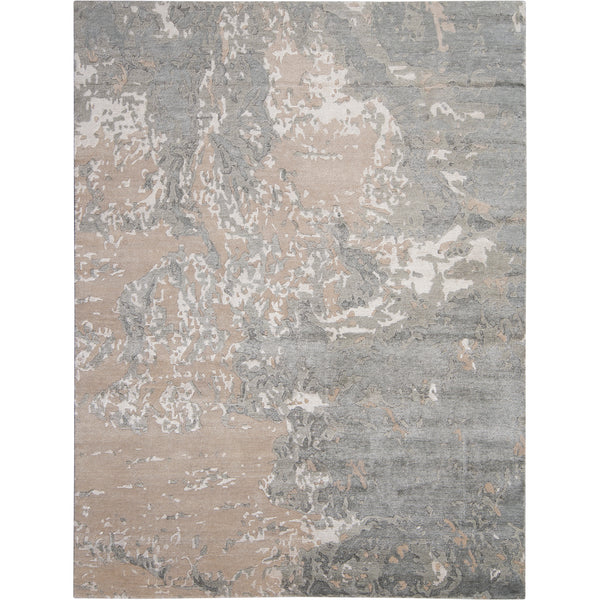 Rectangular area rug with modern abstract design in shades of grey and beige tones
