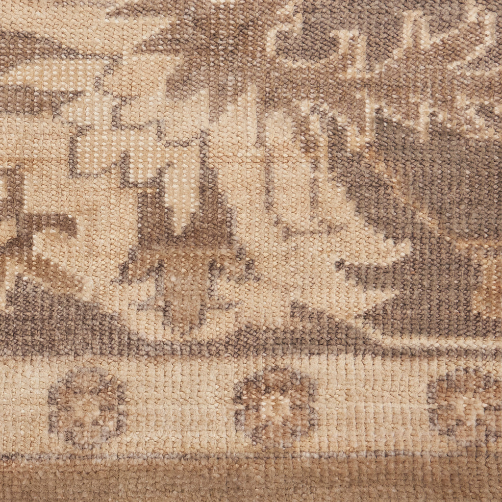 Detailed traditional carpet with intricate geometric and floral patterns.