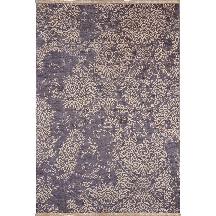 Ornate grey and beige rug with symmetrical floral design.