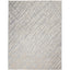 Contemporary abstract rug with angular lines and muted color palette.