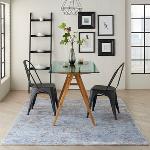 Faded blue rectangular area rug with distressed vintage pattern. - hover