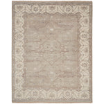 Ornate handwoven rug featuring intricate patterns and traditional influences.