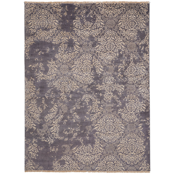 Intricate floral and ornamental rug with distressed, well-maintained appearance.