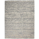 Abstract rectangular area rug with modern distressed camo-like design
