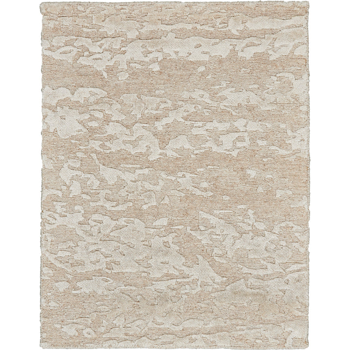 Neutral-toned textured area rug adds sophistication to any interior.