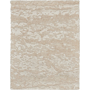 Neutral-toned textured area rug adds sophistication to any interior.
