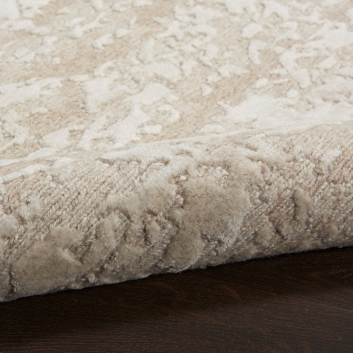 Plush cream-colored carpet adds a touch of luxury to space.