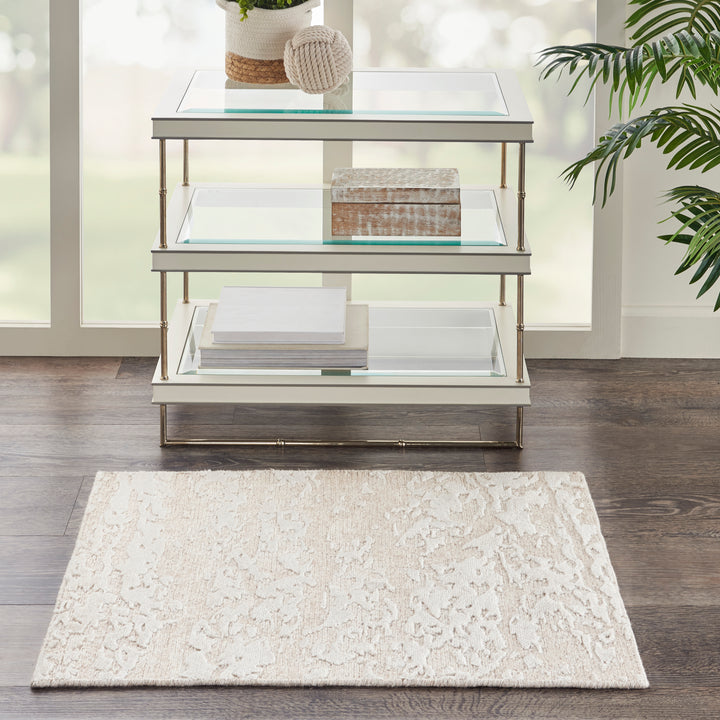 Stylish, contemporary shelf unit with metallic frame and glass shelves.