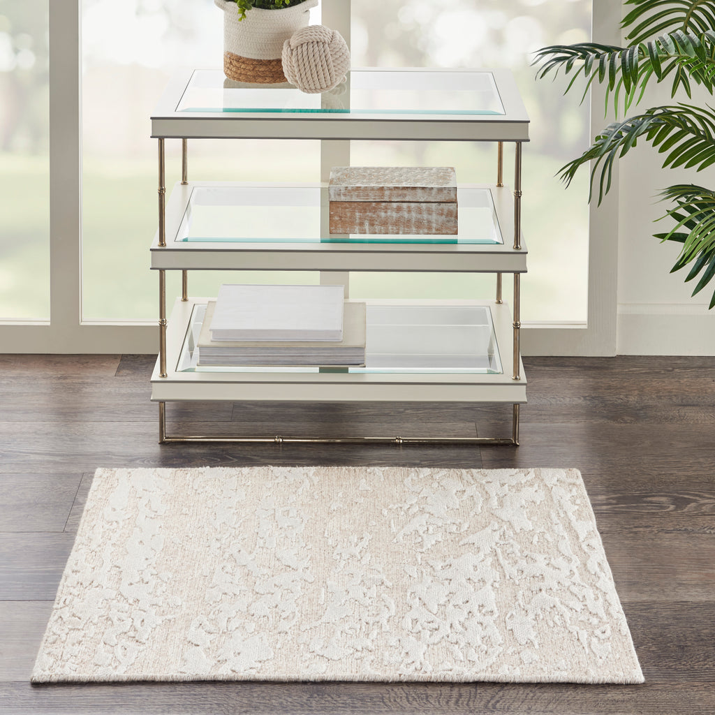 Stylish, contemporary shelf unit with metallic frame and glass shelves.