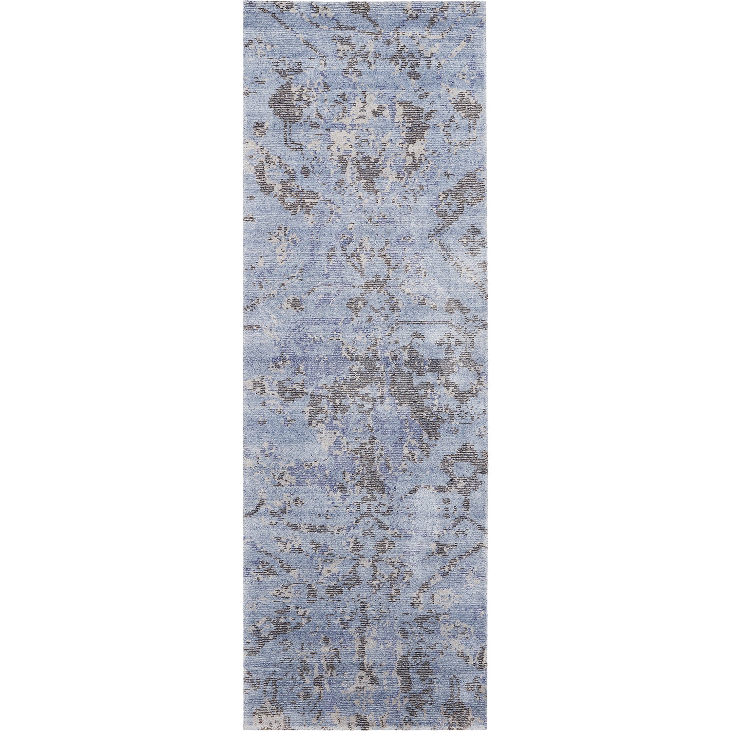 Vintage-inspired blue area rug with abstract distressed design.