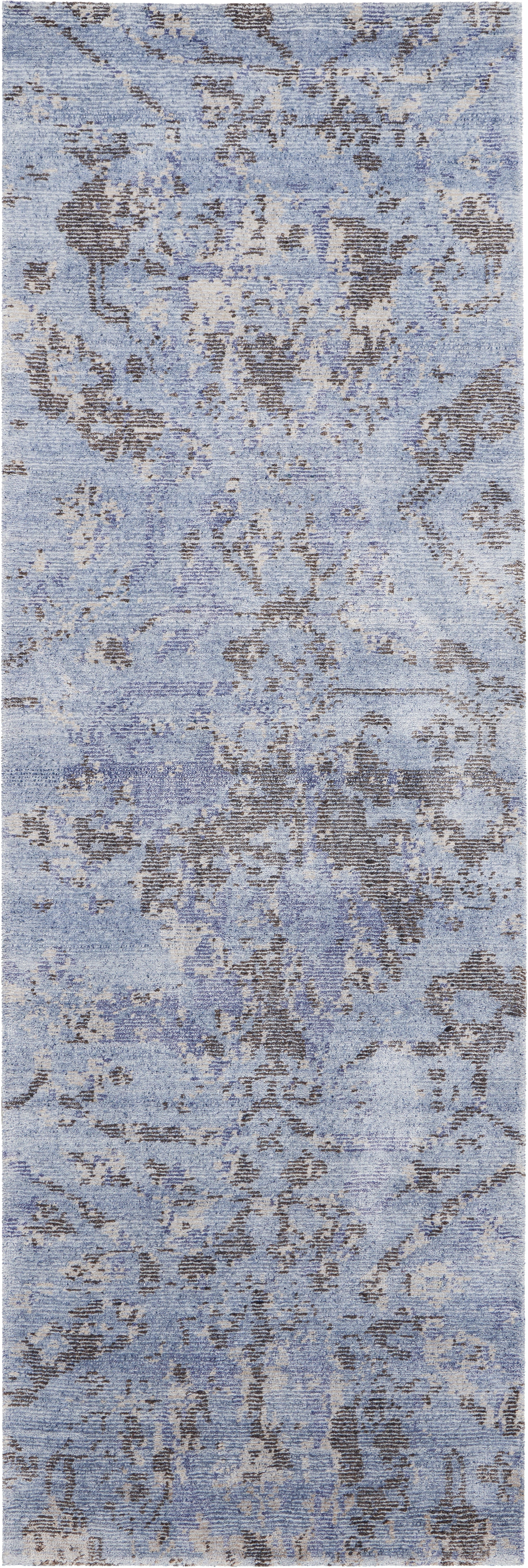 Rectangular blue rug with distressed abstract pattern, perfect for modern interiors.