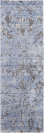 Rectangular blue rug with distressed abstract pattern, perfect for modern interiors.