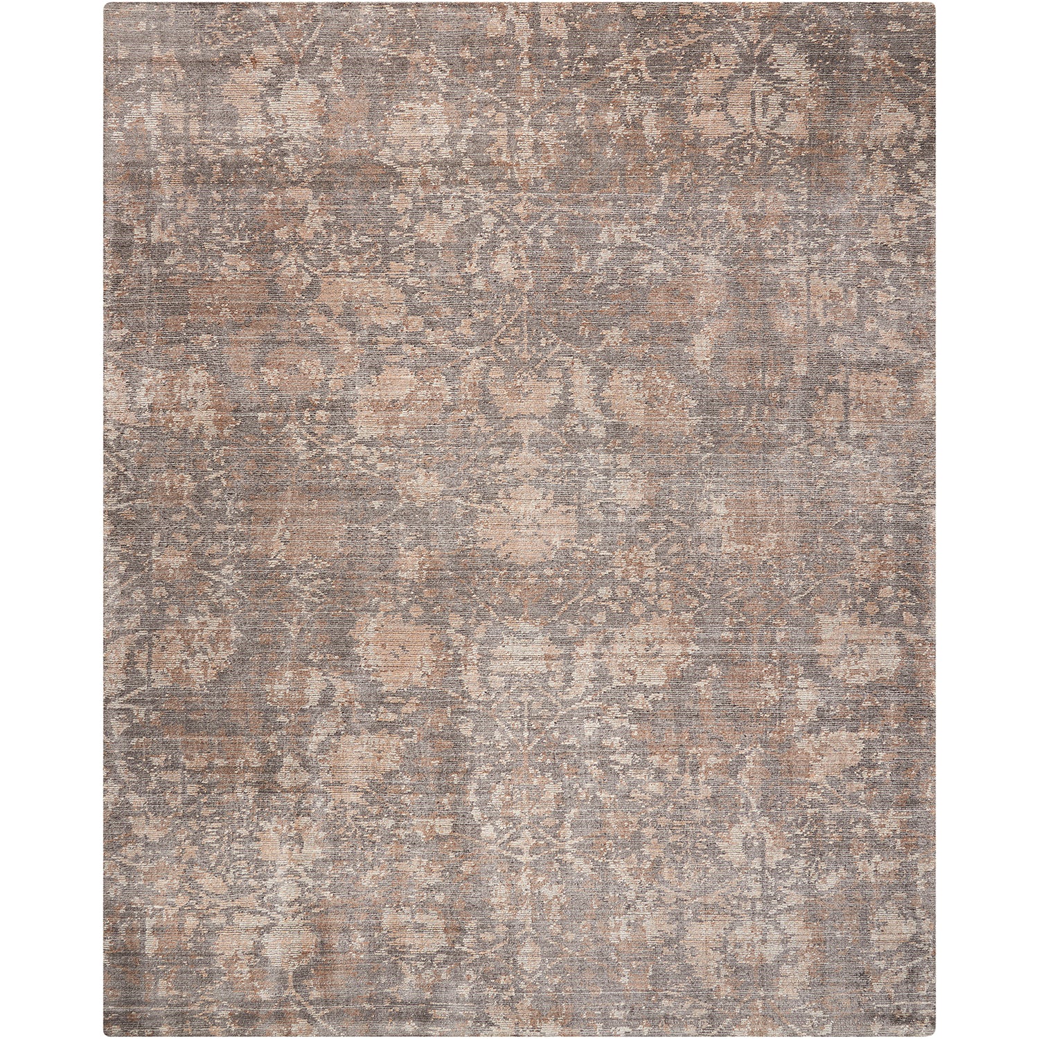 Vintage-inspired rectangular area rug with faded floral pattern in muted tones.