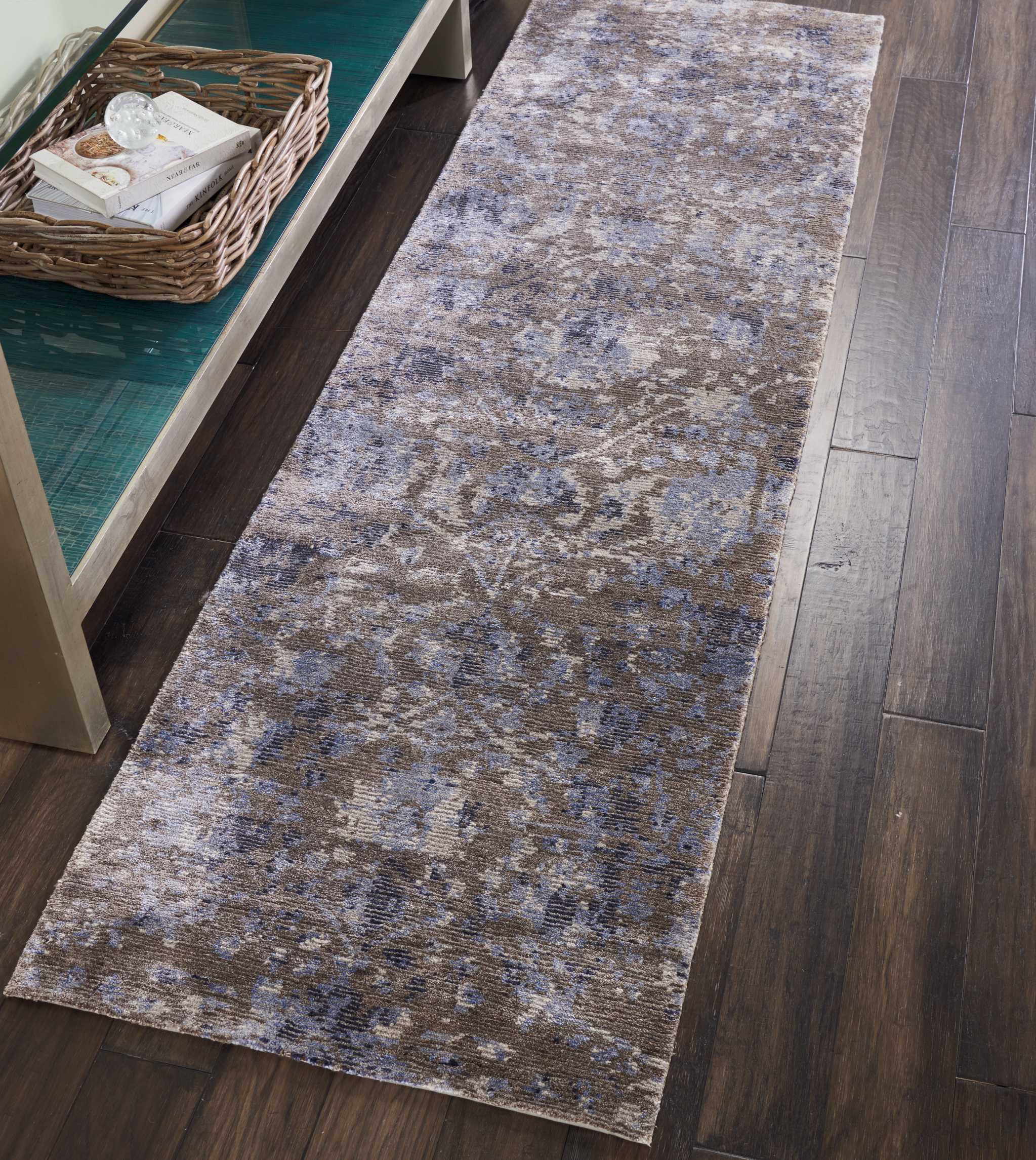 Contemporary rug with abstract distressed pattern complements modern home décor.