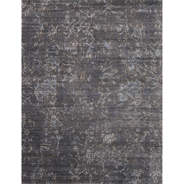 Vintage-style rectangular area rug with distressed floral pattern in grey-blue tones.
