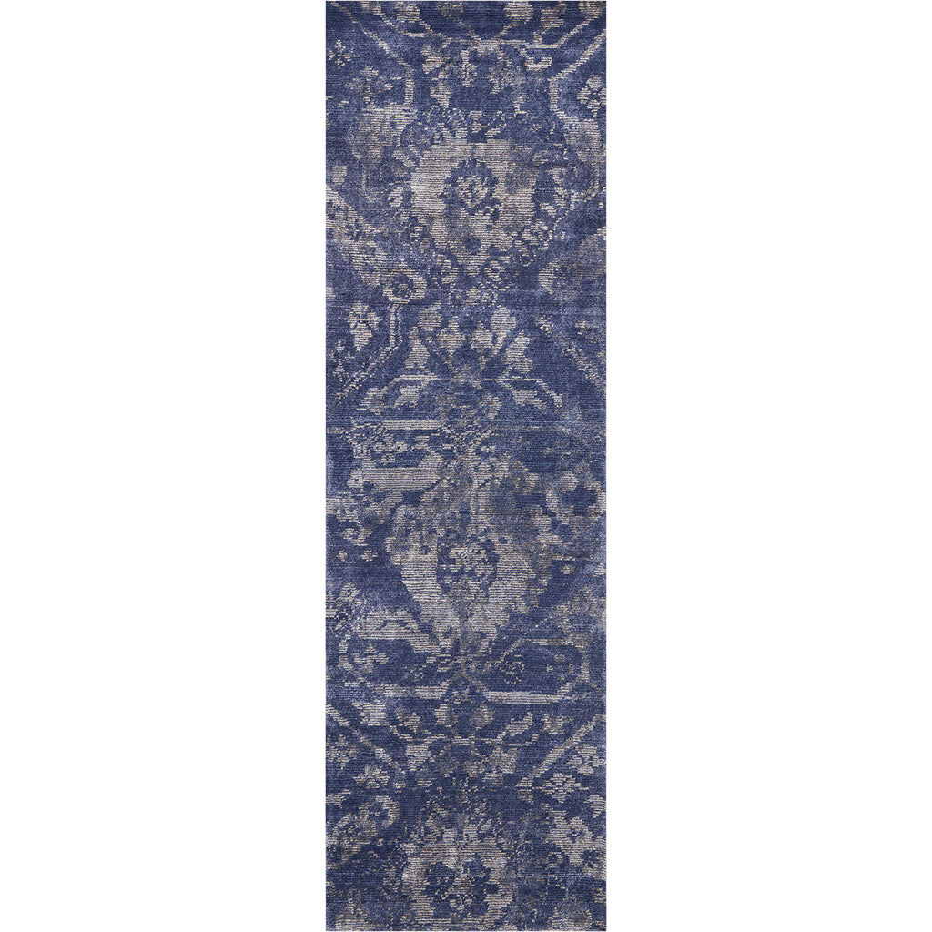 Vintage blue carpet runner with intricate Oriental-inspired floral patterns.