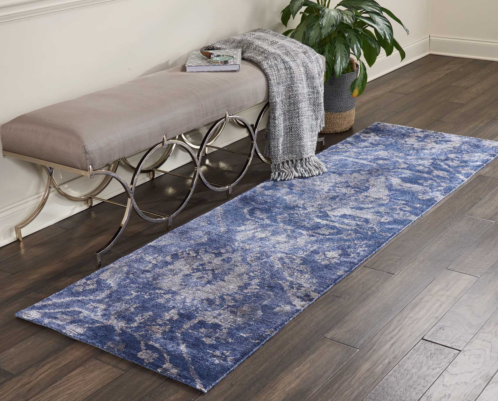 Contemporary interior with a blue and white patterned runner rug