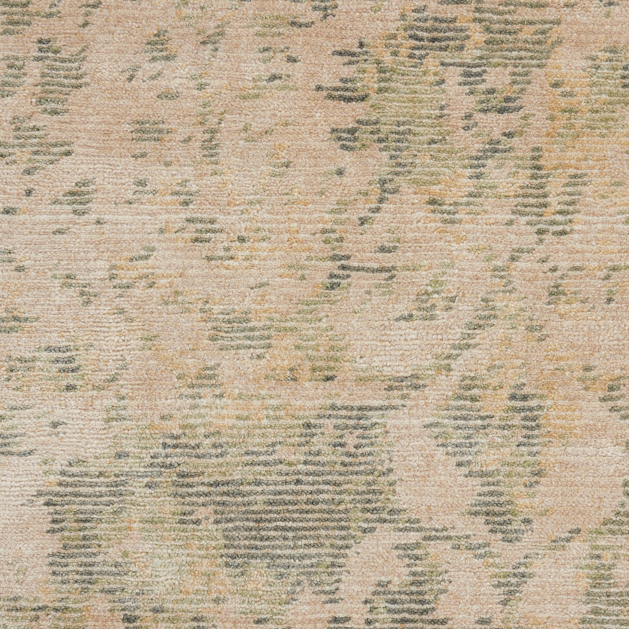 Section of fabric with intricate woven pattern resembling vintage rug.