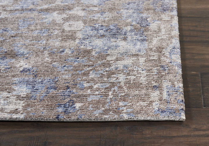 Close-up of a textured rug with a colorful pattern