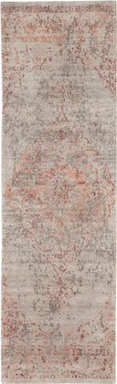 Contemporary rectangular rug with distressed gray and red pattern.