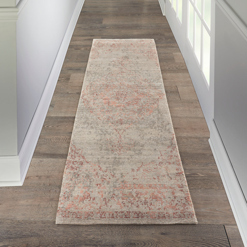 Vintage-inspired rug adds warmth and character to hallway decor.